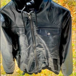 This is a leather jacket with a soft hood and inside.